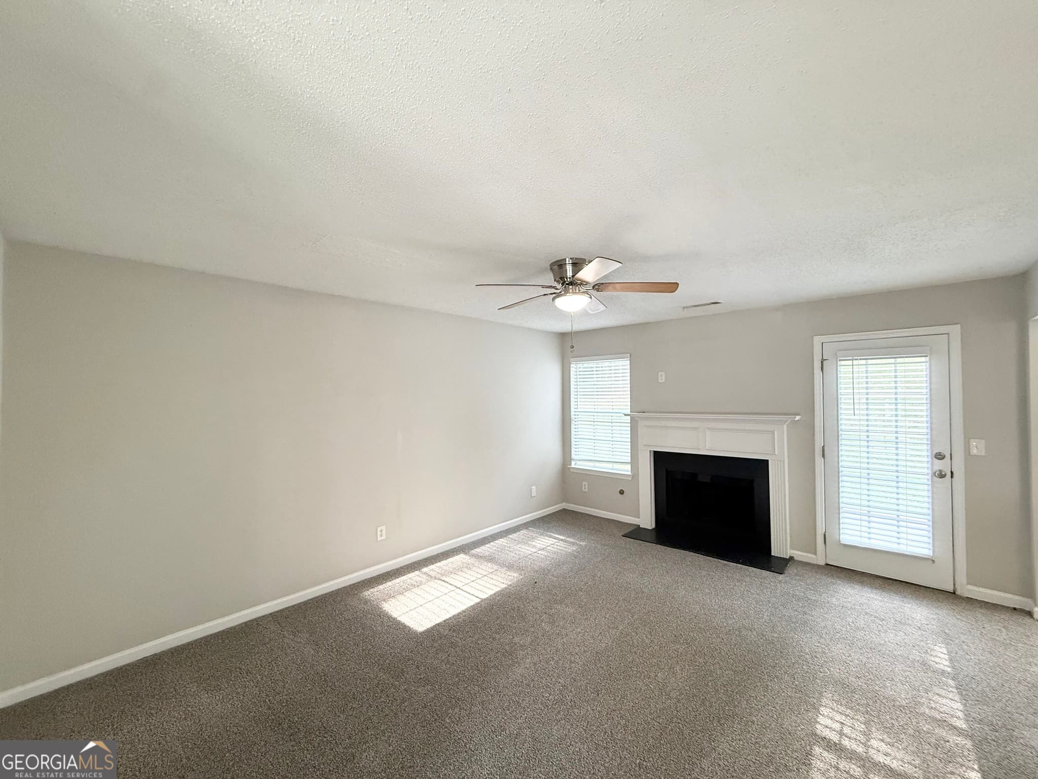 4 bedroom, 2.5 bathroom, 1,648 sq ft single family residence for sale at 4691 Derby Loop, Fairburn, GA 30213 — photo 4