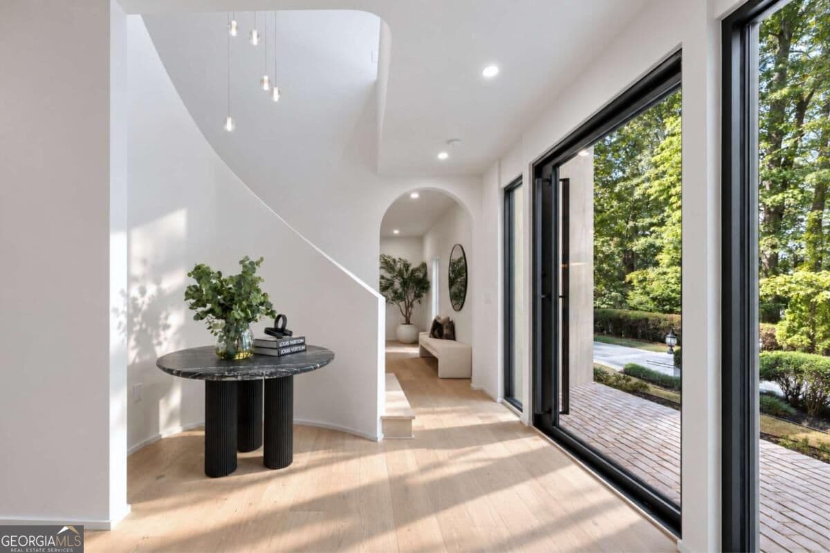 6 bedroom, 7.5 bathroom, 8,090 sq ft single family residence for sale at 1120 Heards Ferry Road, Sandy Springs, GA 30328 — photo 3