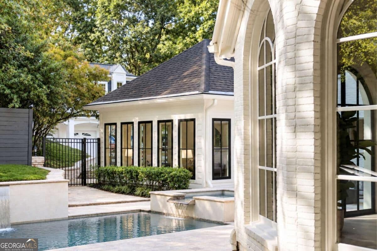 6 bedroom, 7.5 bathroom, 8,090 sq ft single family residence for sale at 1120 Heards Ferry Road, Sandy Springs, GA 30328 — photo 9