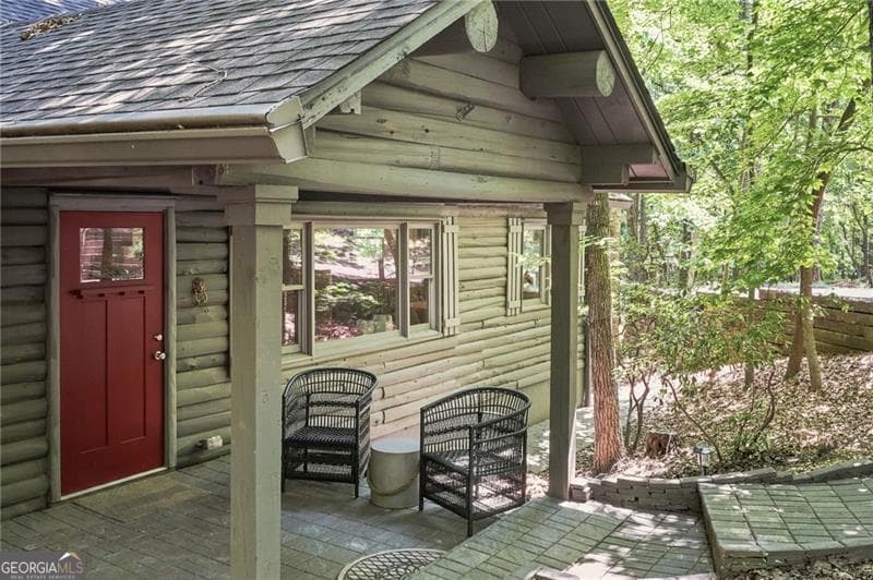 4 bedroom, 2 bathroom, 2,726 sq ft cabin,single family residence for sale at 884 Quail Cove Drive, Big Canoe, GA 30143 — photo 2