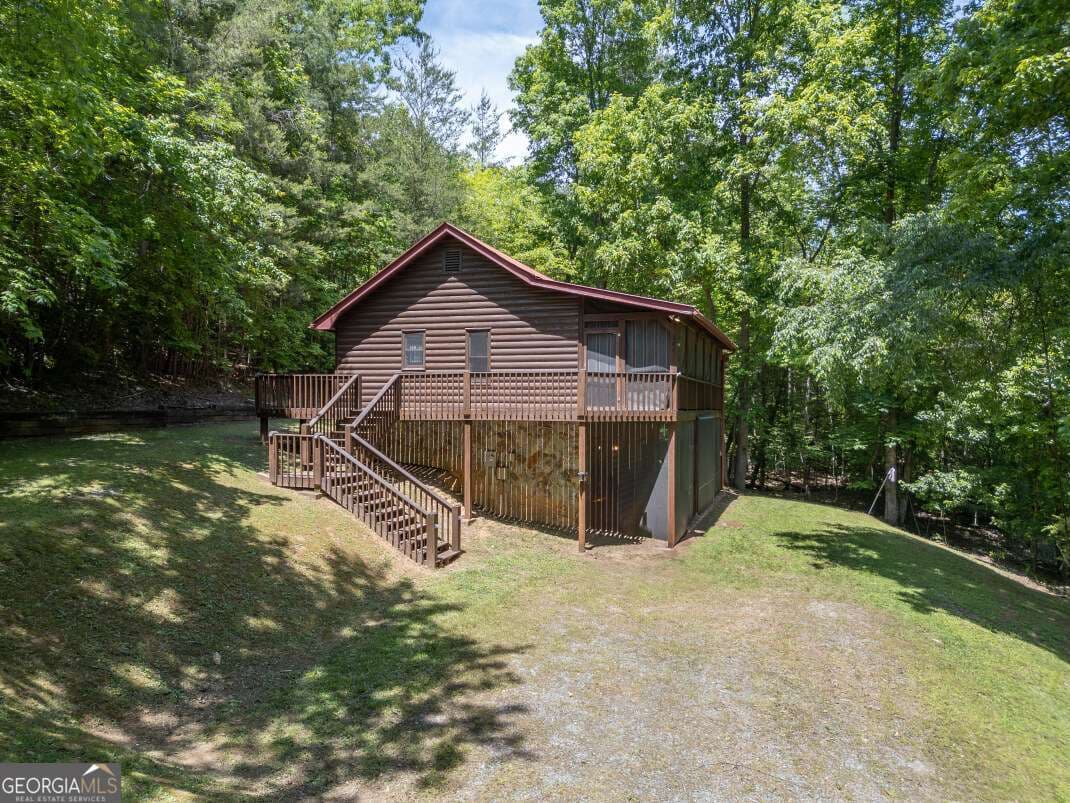 2 bedroom, 2 bathroom, 1,080 sq ft cabin,single family residence sold at 166 Lake Ridge Drive, Blue Ridge, GA 30513
