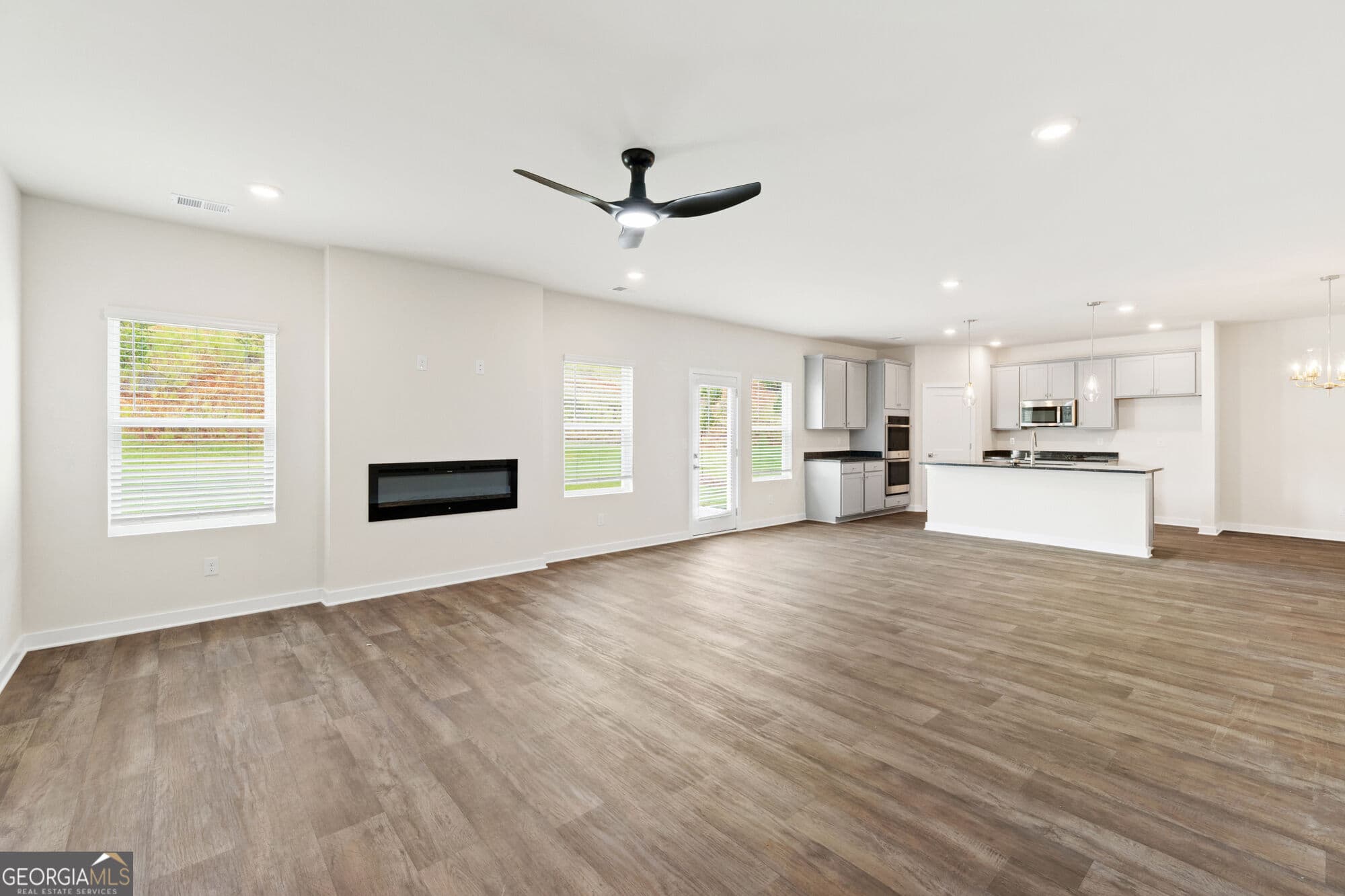 4 bedroom, 3 bathroom, 2,700 sq ft single family residence for sale at 1921 WHEAT VALLEY Circle, Conyers, GA 30013 — photo 6