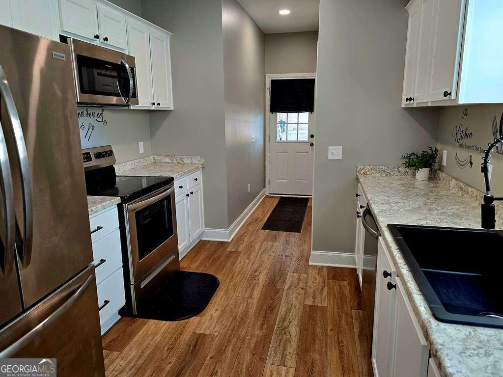 3 bedroom, 2 bathroom, 1,242 sq ft single family residence for sale at 153 Clare Road, Fitzgerald, GA 31750 — photo 3