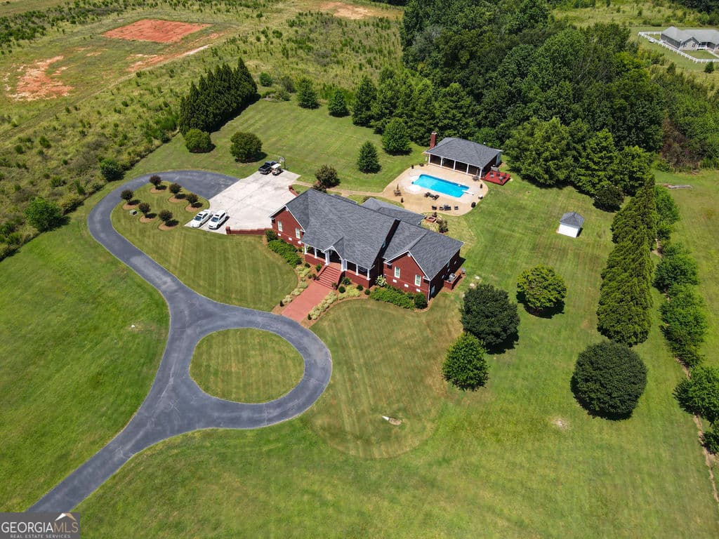 3 bedroom, 3.5 bathroom, 4,172 sq ft single family residence for sale at 240 Community House Road, Barnesville, GA 30204