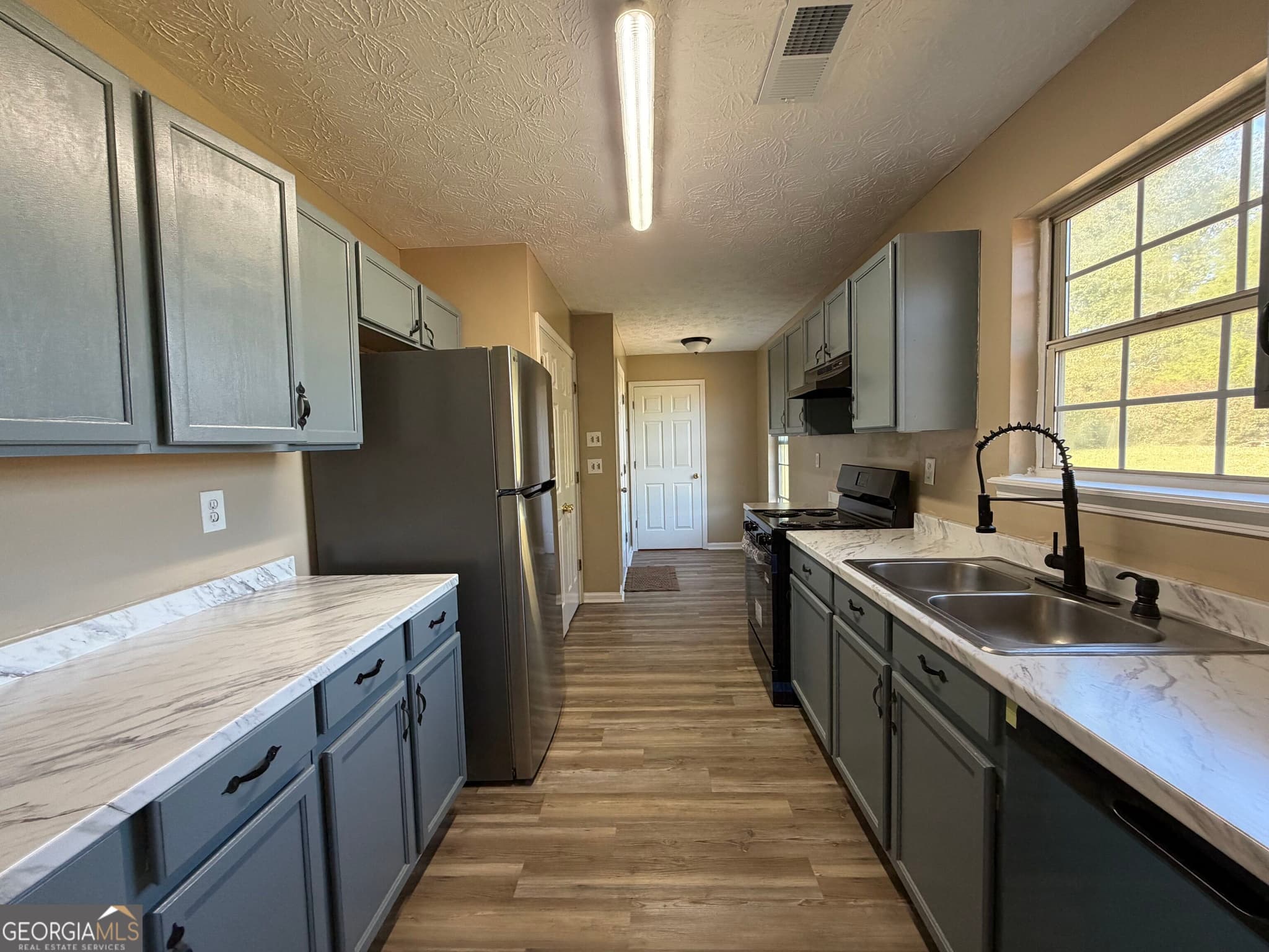 3 bedroom, 2 bathroom, 1,348 sq ft single family residence for rent at 379 Friendship Church Road, Monroe, GA 30656 for $1,800 a month — photo 3