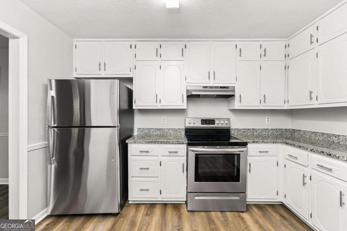 3 bedroom, 2 bathroom single family residence for rent at 2600 King George Court, Conyers, GA 30012 for $1,680 a month — photo 3