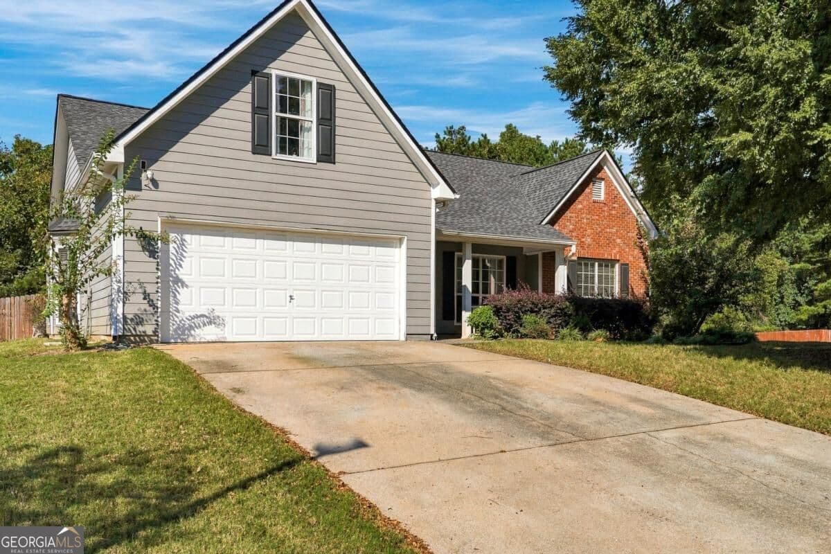 4 bedroom, 2 bathroom, 1,948 sq ft single family residence for sale at 2590 Harbins Mill Drive, Dacula, GA 30019 — photo 2
