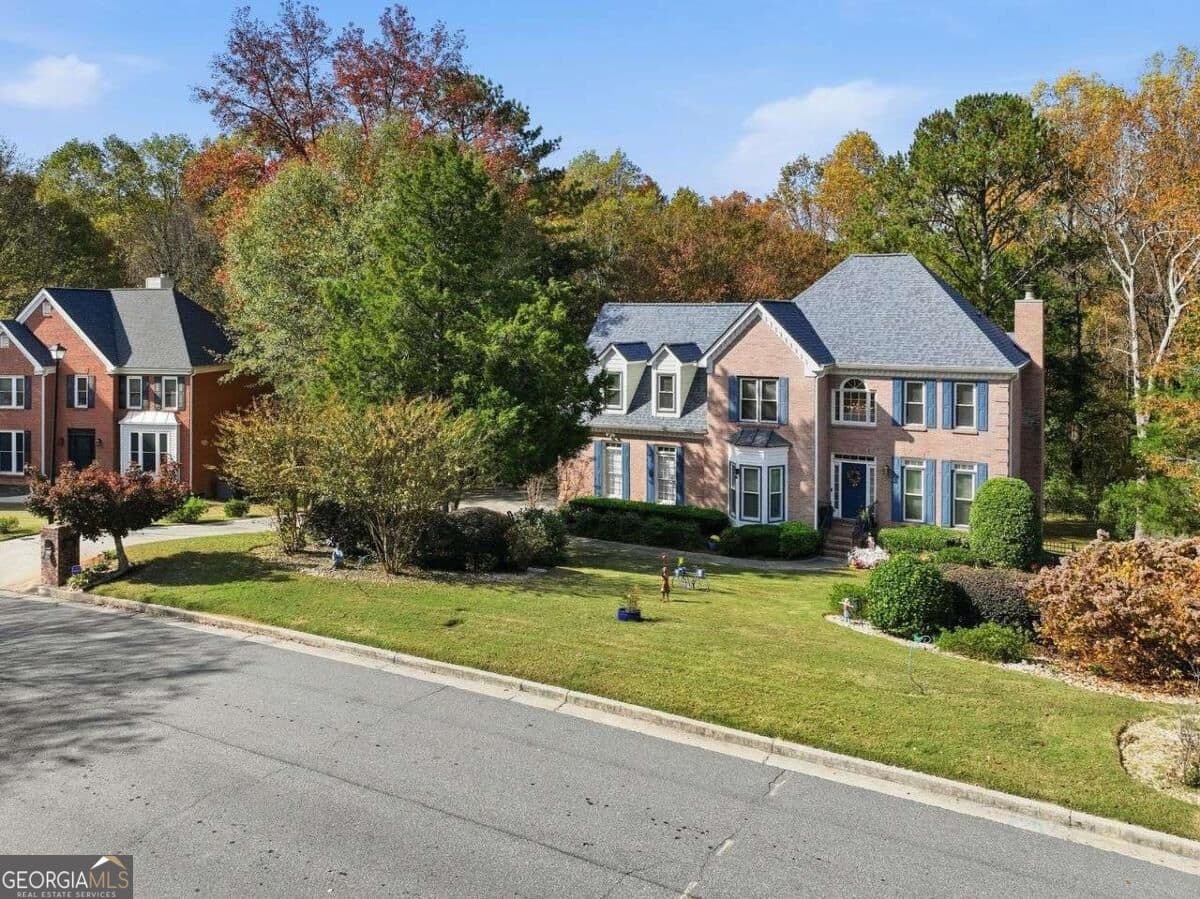 5 bedroom, 2.5 bathroom, 3,057 sq ft single family residence for sale at 1535 Timberline Trace, Snellville, GA 30078 — photo 2
