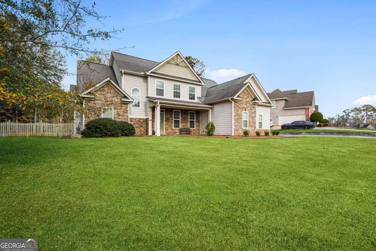 4 bedroom, 3.5 bathroom, 2,708 sq ft single family residence for sale at 6460 Bellevue Drive, Conyers, GA 30094 — photo 2