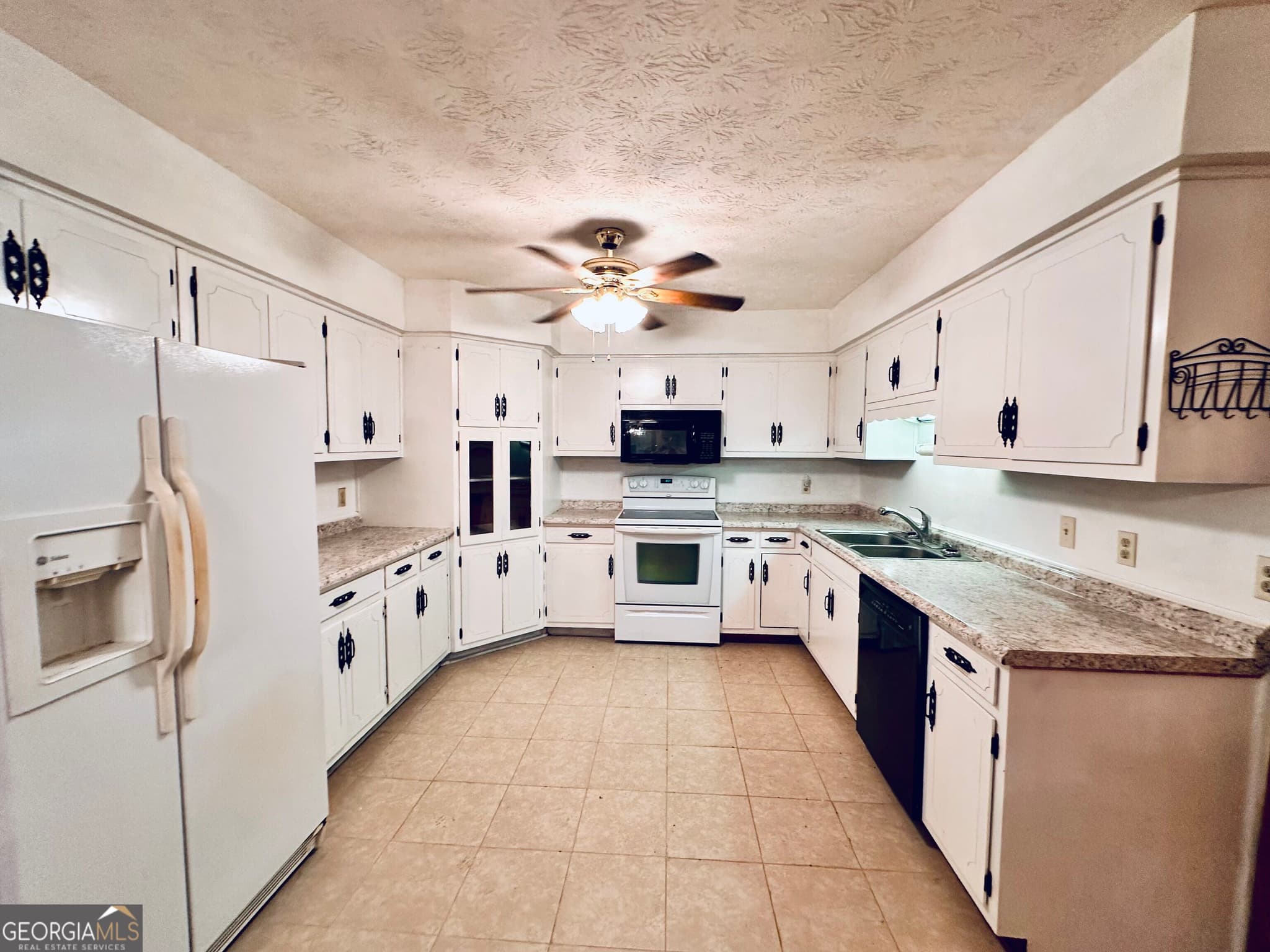 4 bedroom, 3 bathroom, 2,046 sq ft single family residence for sale at 6009 James Street, Manor, GA 31550 — photo 5