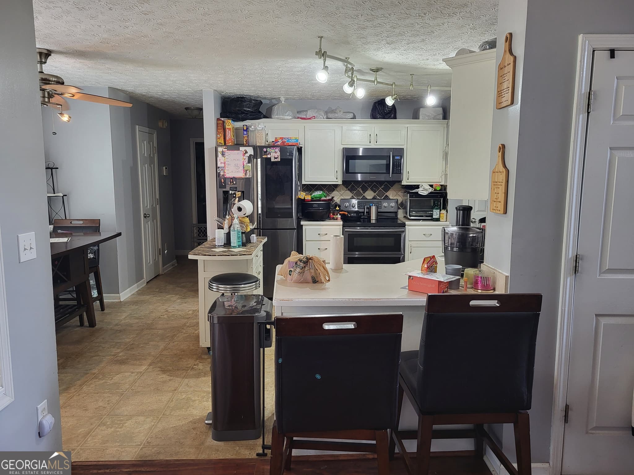 4 bedroom, 2.5 bathroom, 1,911 sq ft single family residence for sale at 230 Hastings Court, Mcdonough, GA 30252 — photo 4