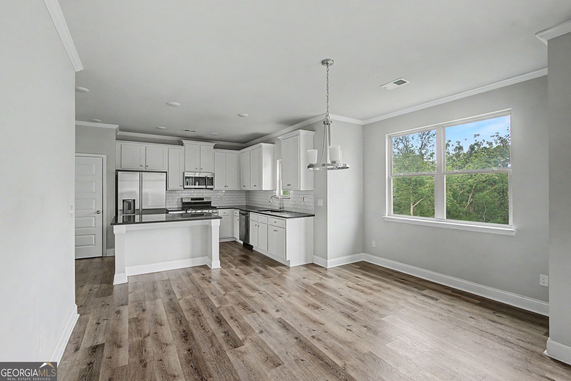 4 bedroom, 2.5 bathroom, 2,289 sq ft single family residence for sale at 5628 Woodland Greens Road, Douglasville, GA 30135 — photo 6