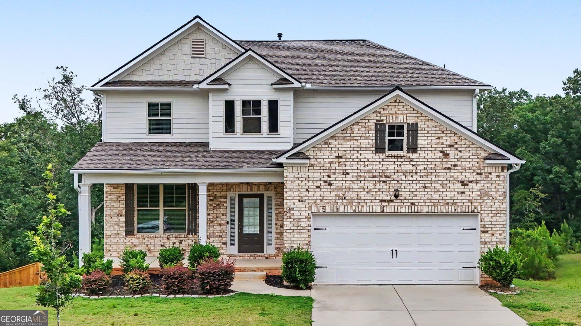 4 bedroom, 2.5 bathroom, 2,289 sq ft single family residence for sale at 5628 Woodland Greens Road, Douglasville, GA 30135 — photo 1 of 31
