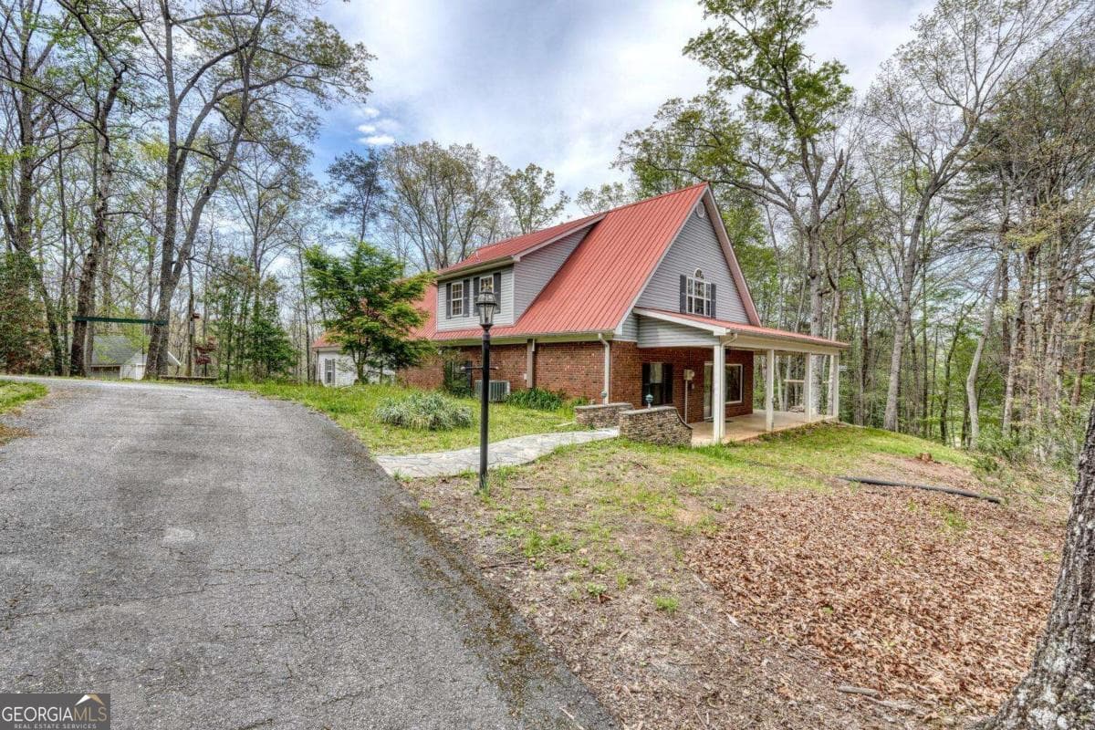 4 bedroom, 3 bathroom, 2,448 sq ft single family residence for sale at 74 Timber Lane, Blairsville, GA 30512 — photo 4