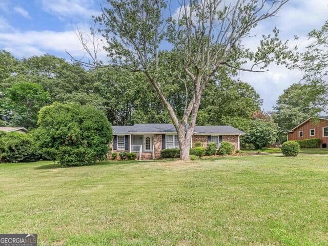 3 bedroom, 2 bathroom, 1,763 sq ft single family residence for sale at 2521 Country Club Drive, Conyers, GA 30013 — photo 2