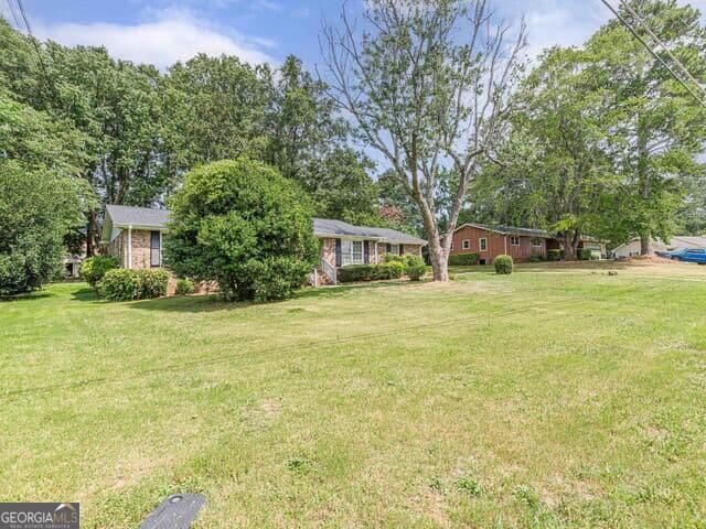 3 bedroom, 2 bathroom, 1,763 sq ft single family residence for sale at 2521 Country Club Drive, Conyers, GA 30013 — photo 5