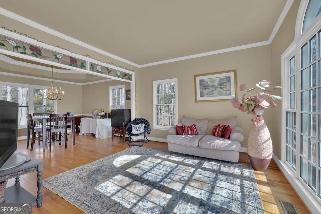 5 bedroom, 3.5 bathroom, 3,450 sq ft single family residence for sale at 1420 Olde Forge Lane, Woodstock, GA 30189 — photo 7