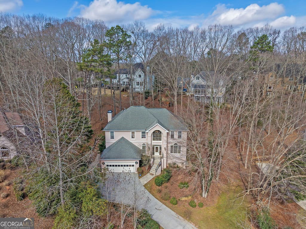 5 bedroom, 3.5 bathroom, 3,450 sq ft single family residence for sale at 1420 Olde Forge Lane, Woodstock, GA 30189 — photo 3