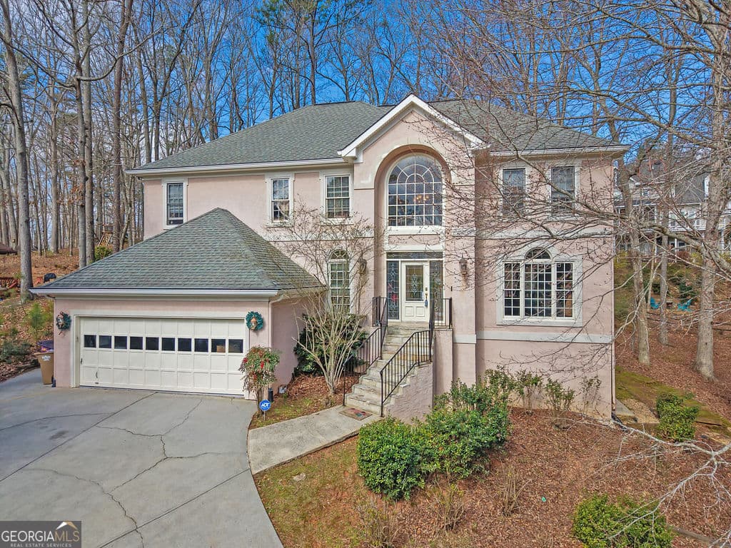 5 bedroom, 3.5 bathroom, 3,450 sq ft single family residence for sale at 1420 Olde Forge Lane, Woodstock, GA 30189