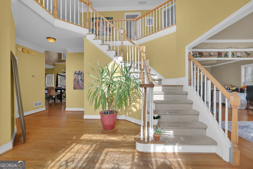 5 bedroom, 3.5 bathroom, 3,450 sq ft single family residence for sale at 1420 Olde Forge Lane, Woodstock, GA 30189 — photo 5