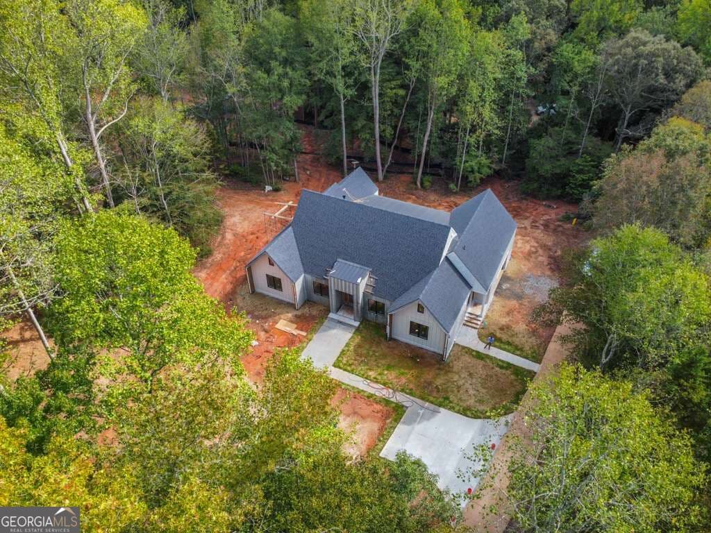 4 bedroom, 3.5 bathroom single family residence for sale at 7405 Nicholson Road, Cumming, GA 30028 — photo 7