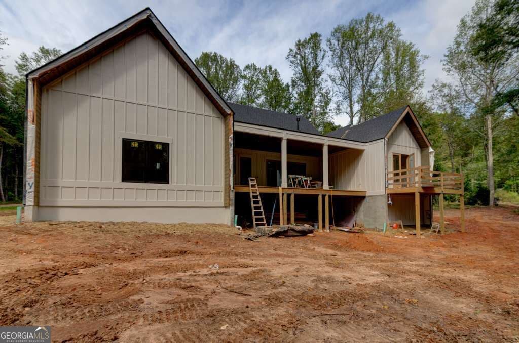 4 bedroom, 3.5 bathroom single family residence for sale at 7405 Nicholson Road, Cumming, GA 30028 — photo 3