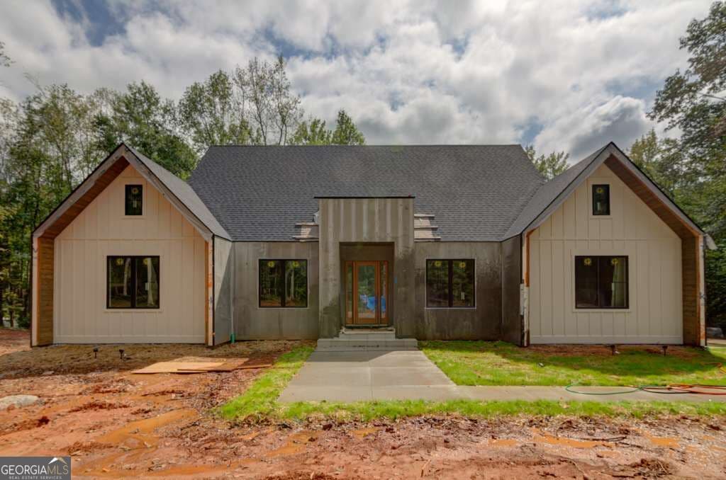 4 bedroom, 3.5 bathroom single family residence for sale at 7405 Nicholson Road, Cumming, GA 30028