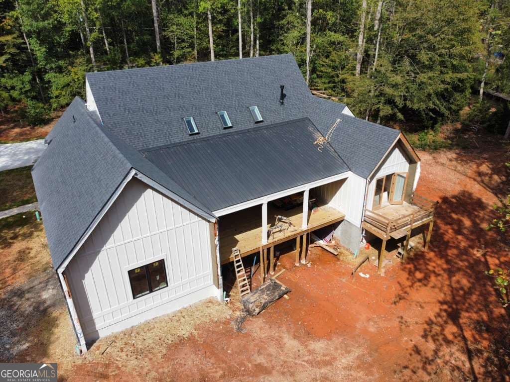4 bedroom, 3.5 bathroom single family residence for sale at 7405 Nicholson Road, Cumming, GA 30028 — photo 5