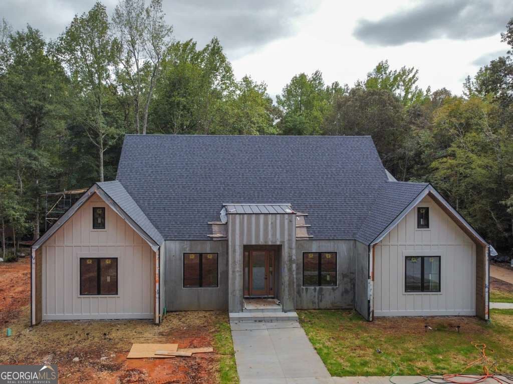 4 bedroom, 3.5 bathroom single family residence for sale at 7405 Nicholson Road, Cumming, GA 30028 — photo 4