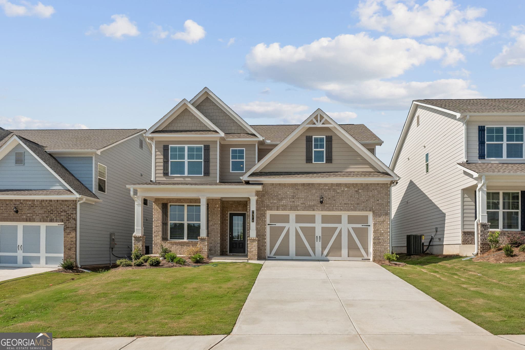 4 bedroom, 2.5 bathroom, 2,428 sq ft single family residence for sale at 7376 ROCKLIN Lane, Flowery Branch, GA 30542 — photo 1 of 29