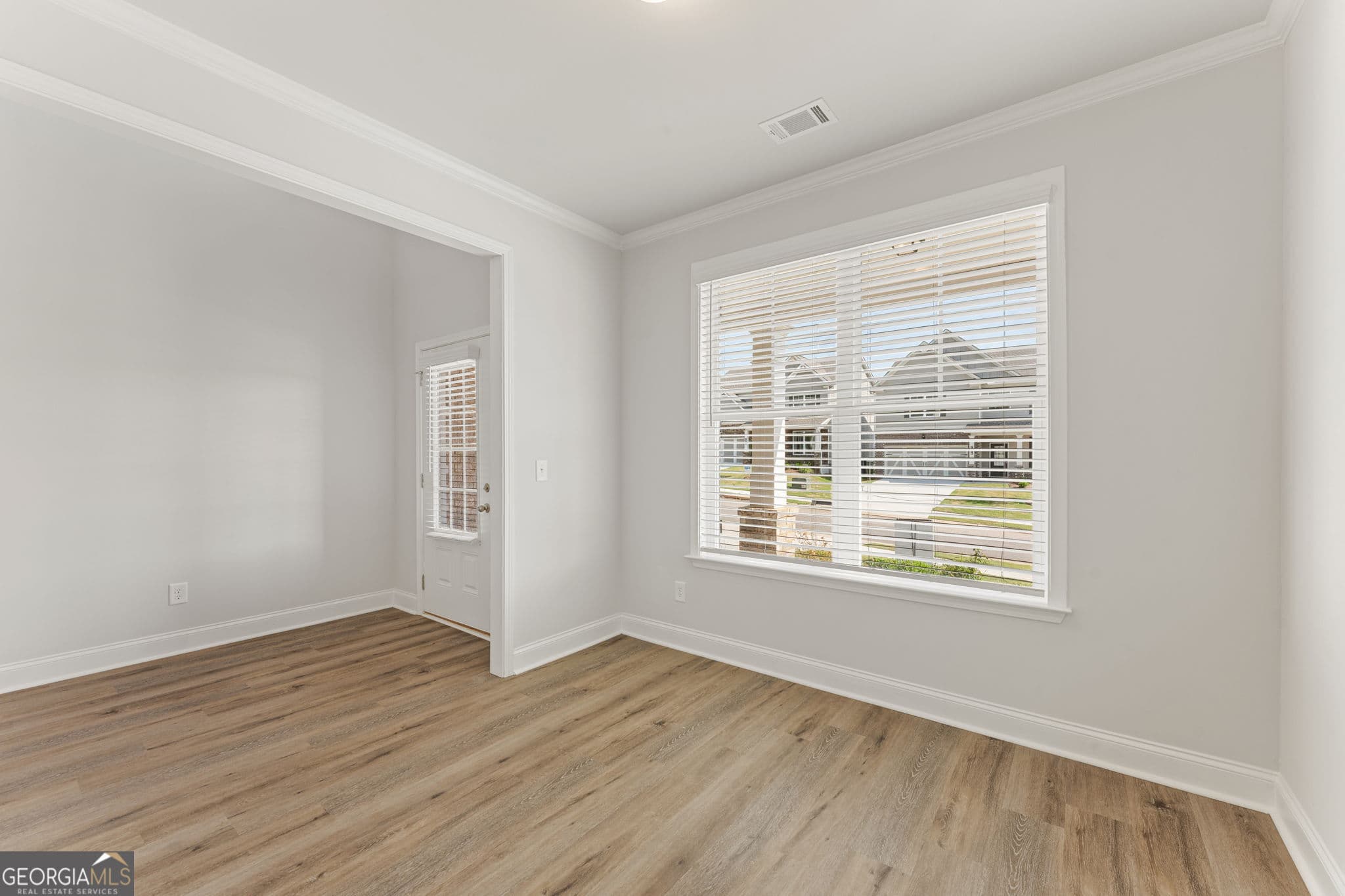 4 bedroom, 2.5 bathroom, 2,428 sq ft single family residence for sale at 7376 ROCKLIN Lane, Flowery Branch, GA 30542 — photo 5