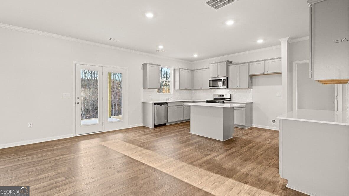 5 bedroom, 4.5 bathroom, 3,389 sq ft single family residence for sale at 1427 Lincoln Lane, Braselton, GA 30517 — photo 6