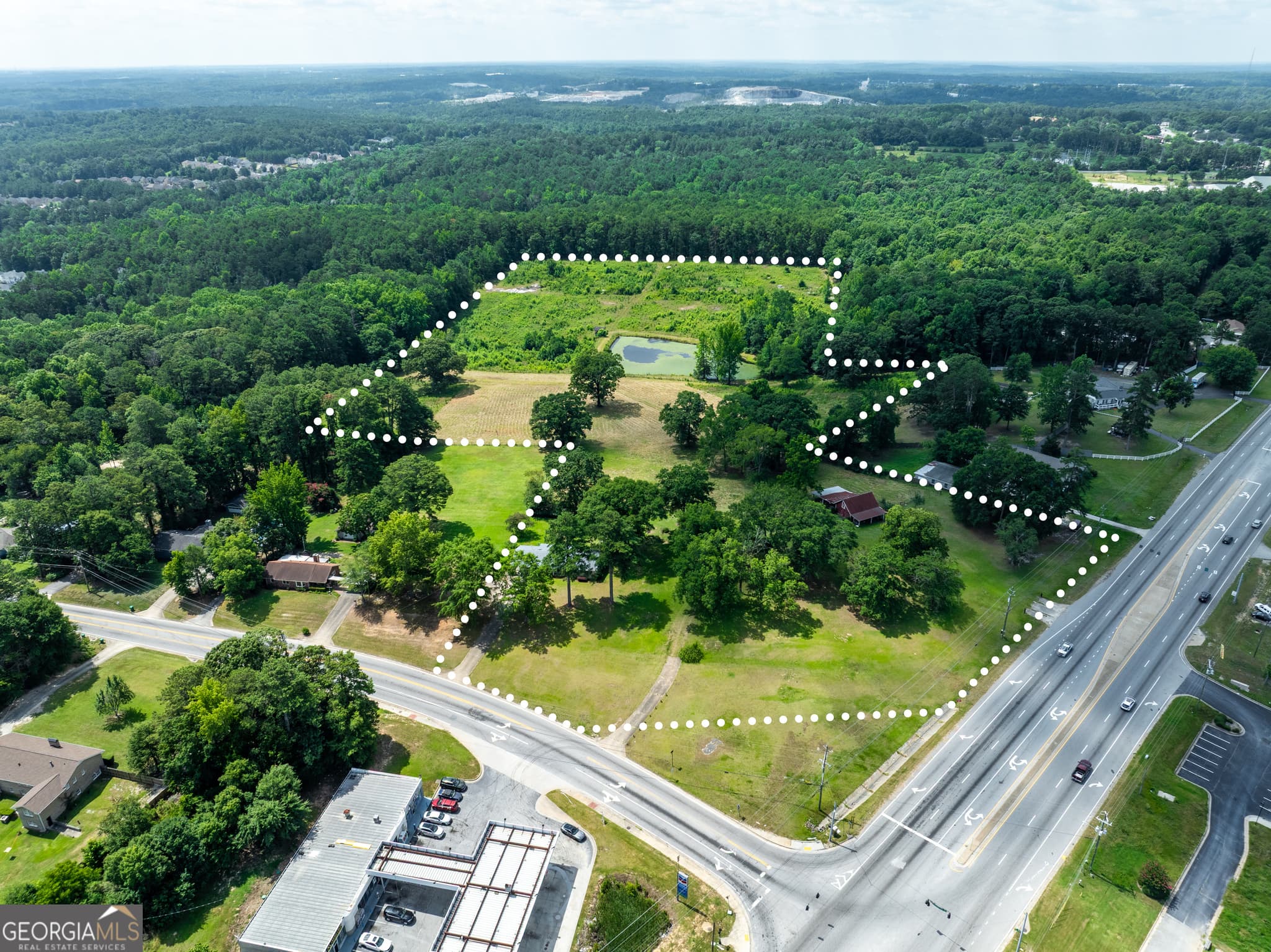 residential lot for sale at 7359 Pleasant Hill Road, Lithonia, GA 30058 — photo 1 of 27
