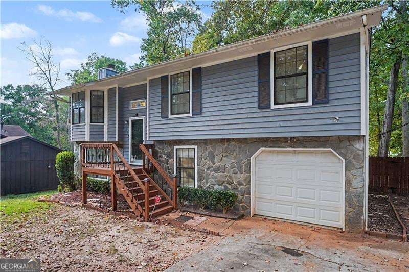 4 bedroom, 2.5 bathroom, 2,141 sq ft single family residence for sale at 1955 Woodlot Trail, Lithonia, GA 30058 — photo 2