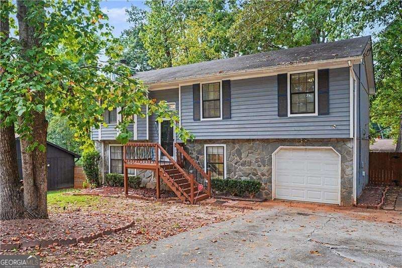 4 bedroom, 2.5 bathroom, 2,141 sq ft single family residence for sale at 1955 Woodlot Trail, Lithonia, GA 30058 — photo 3