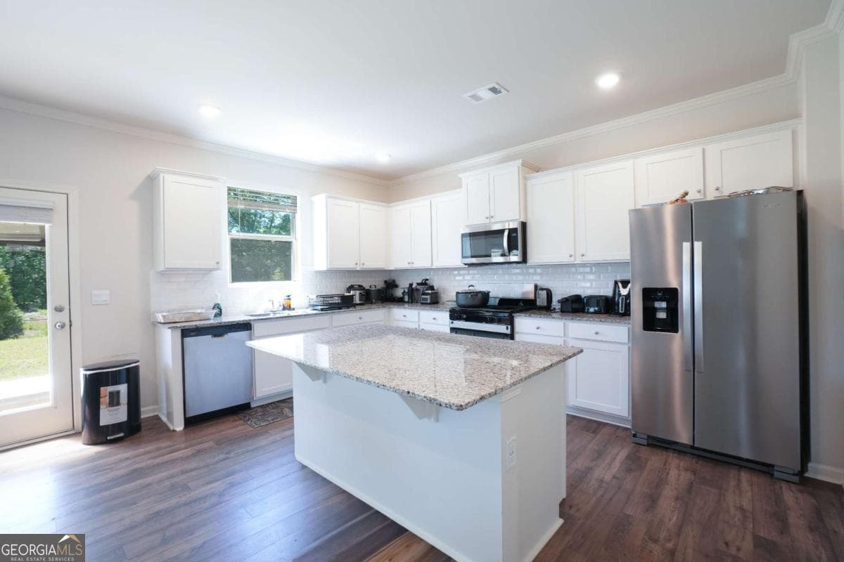 5 bedroom, 3 bathroom loft,single family residence for sale at 1433 Braselton Village Parkway, Braselton, GA 30517 — photo 7