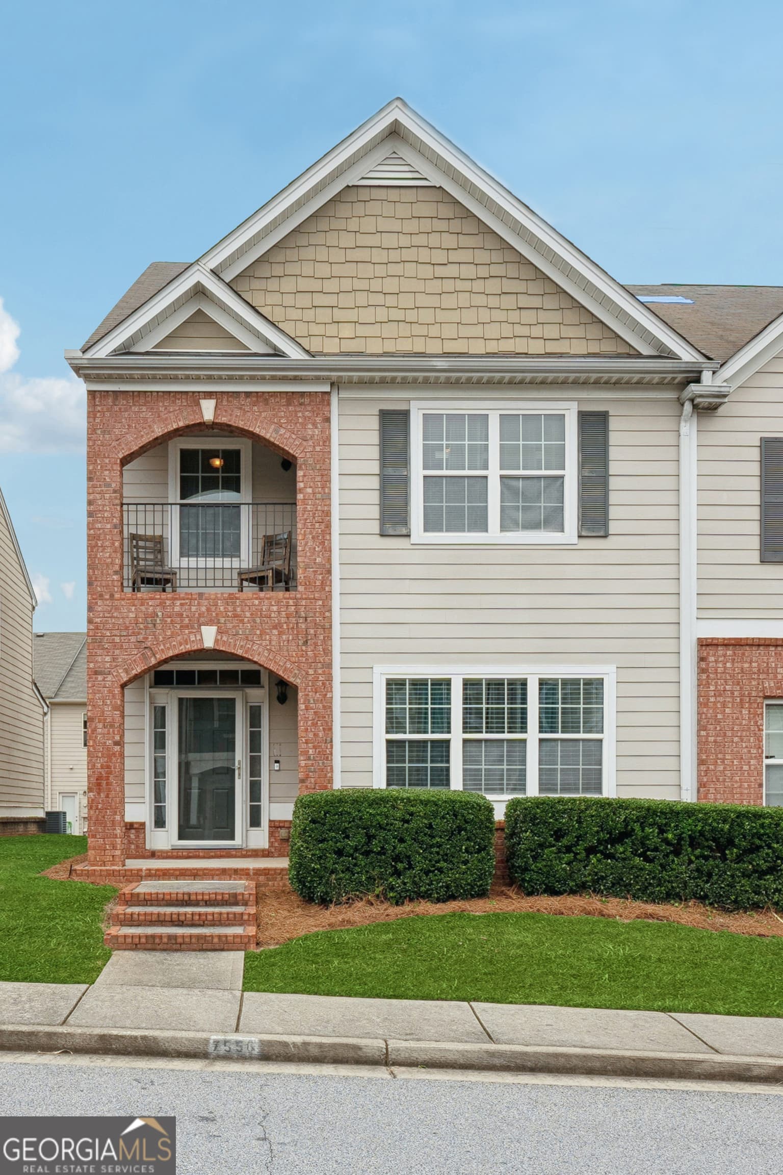 3 bedroom, 2.5 bathroom, 1,780 sq ft townhouse for sale at 7556 Rutgers Circle, Fairburn, GA 30213 — photo 1 of 19