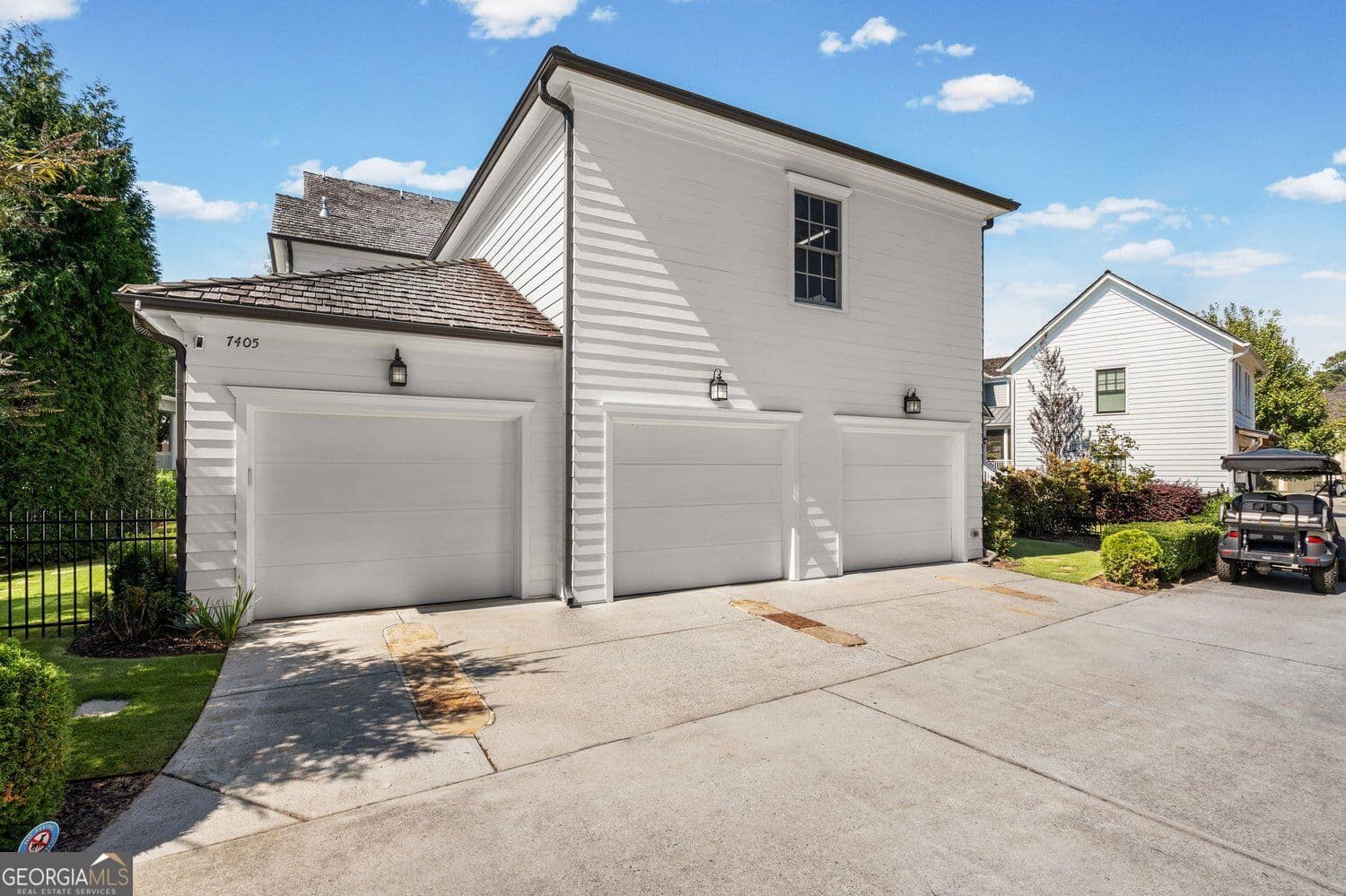 5 bedroom, 4.5 bathroom, 4,174 sq ft single family residence for sale at 7405 Samples Field Road, Cumming, GA 30040 — photo 9
