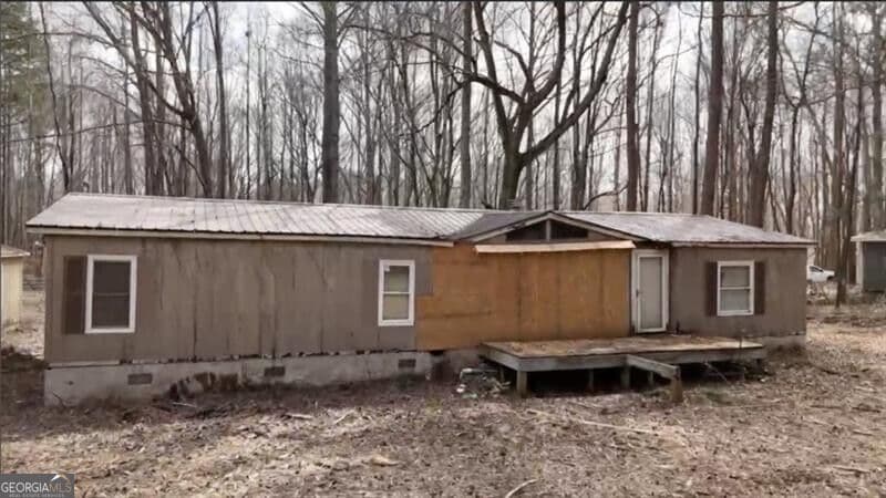 3 bedroom, 2 bathroom, 1,560 sq ft manufactured home,single family residence for sale at 5590 John Burruss Road, Cumming, GA 30040 — photo 2