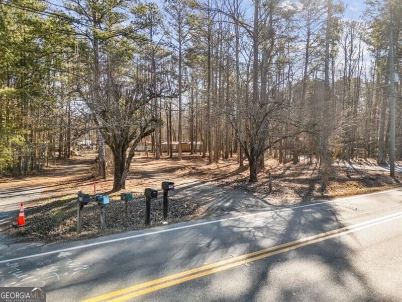 3 bedroom, 2 bathroom, 1,560 sq ft manufactured home,single family residence for sale at 5590 John Burruss Road, Cumming, GA 30040 — photo 9
