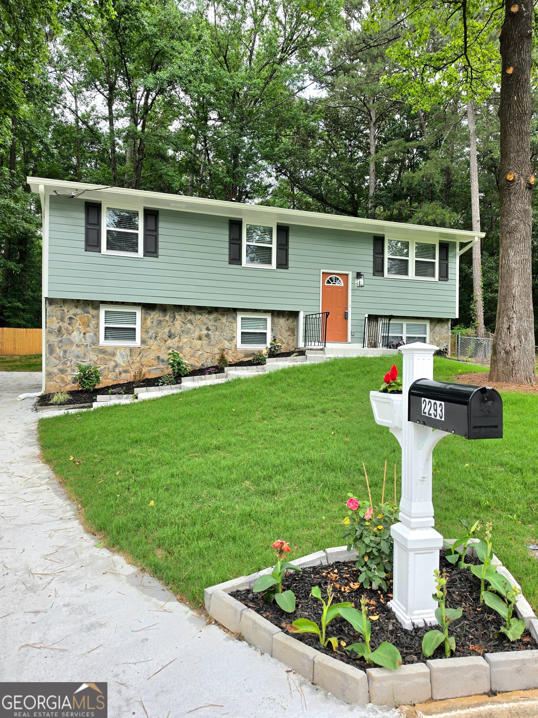 3 bedroom, 3 bathroom, 1,980 sq ft single family residence sold at 2293 Cherokee Valley Drive, Lithonia, GA 30058