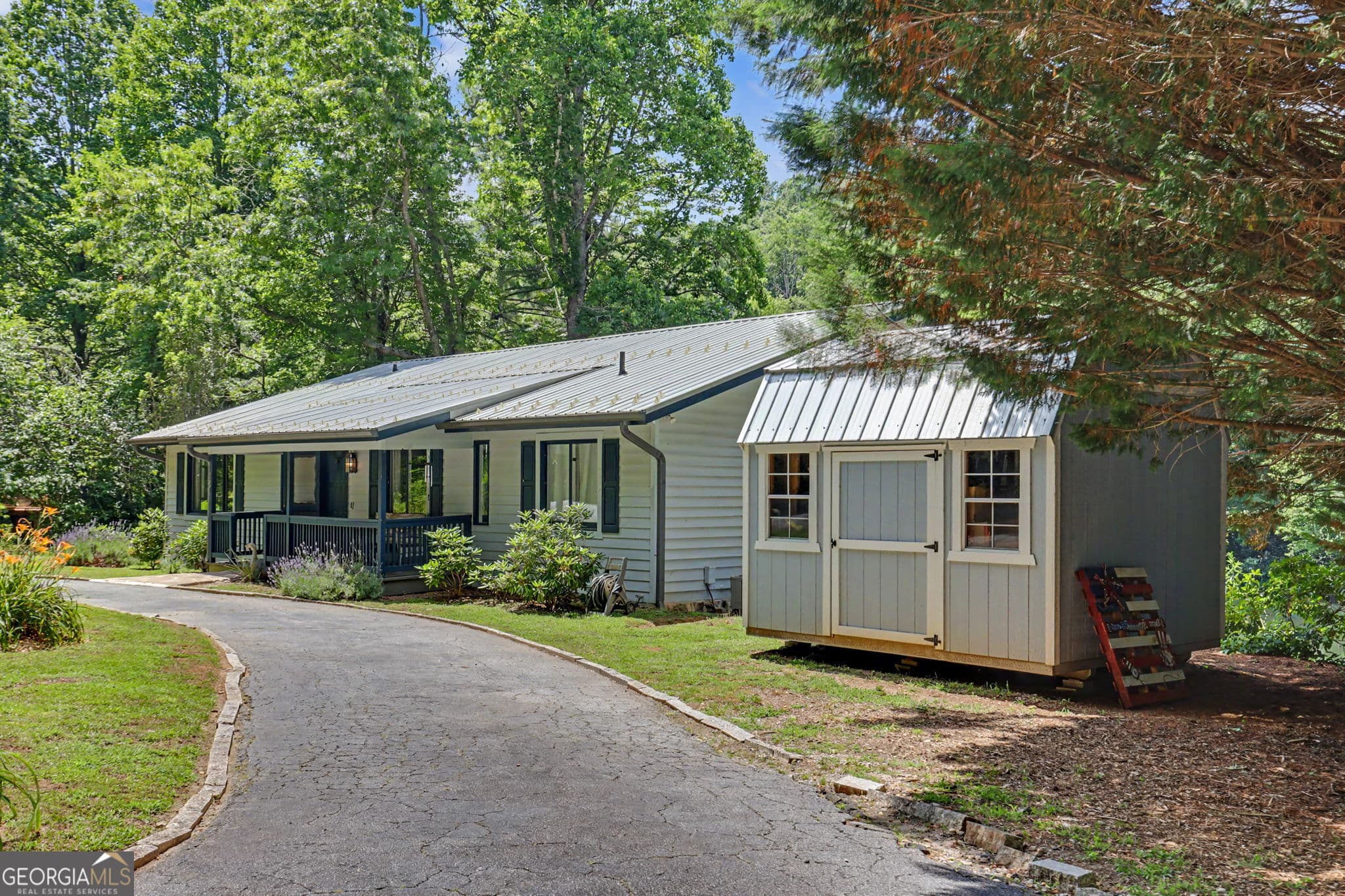 5 bedroom, 3 bathroom, 2,800 sq ft single family residence for sale at 181 Dam Lake Drive, Dillard, GA 30537 — photo 5
