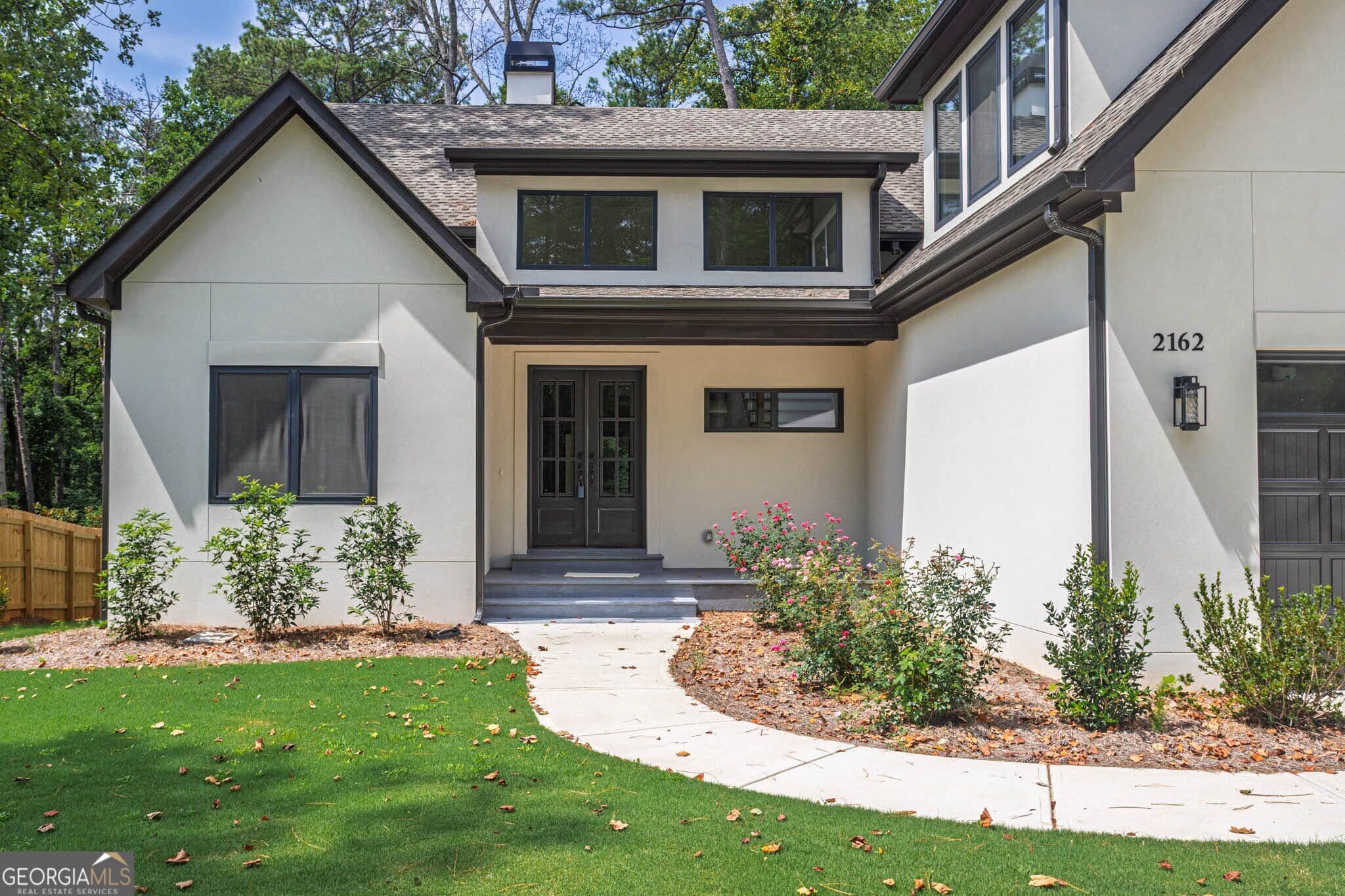 4 bedroom, 3 bathroom, 3,000 sq ft single family residence for sale at 2162 Plantation Road, Lawrenceville, GA 30044 — photo 2
