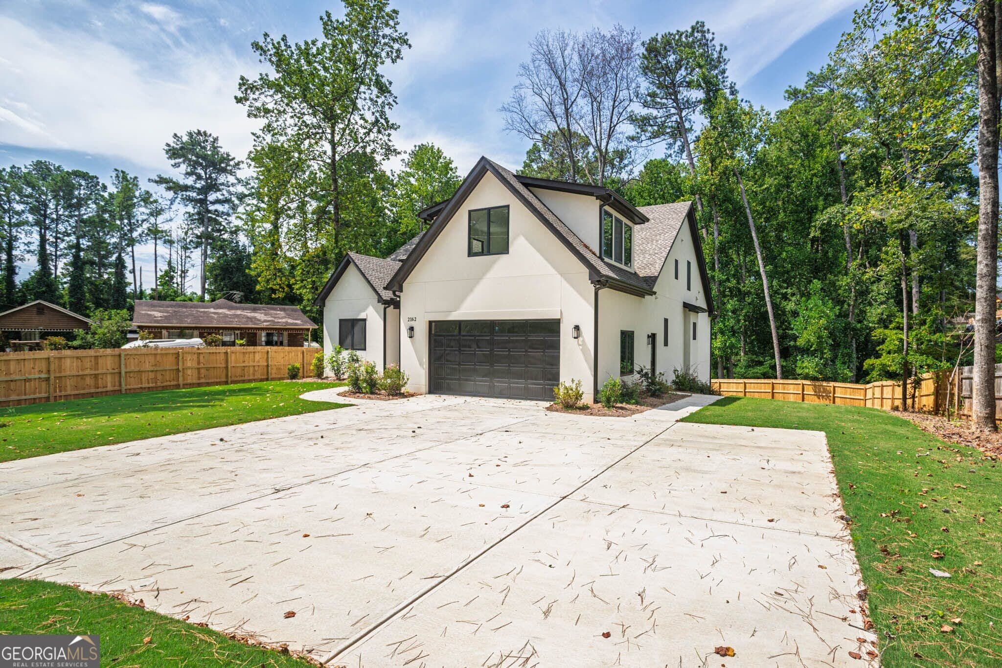 4 bedroom, 3 bathroom, 3,000 sq ft single family residence for sale at 2162 Plantation Road, Lawrenceville, GA 30044 — photo 4