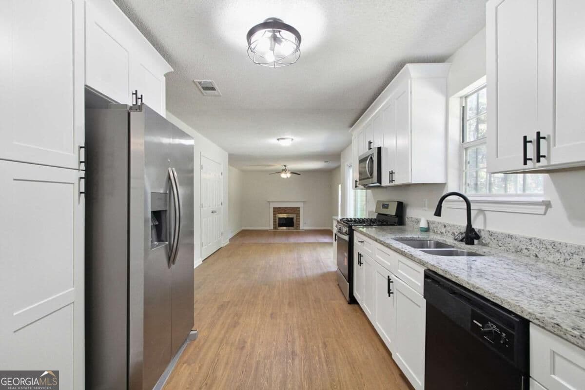 4 bedroom, 3 bathroom single family residence for sale at 2750 Green Marsh Court, Decatur, GA 30034 — photo 7