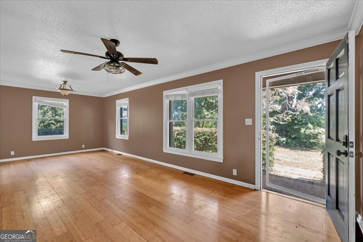 3 bedroom, 2 bathroom, 1,817 sq ft single family residence for sale at 6555 GA Hwy 313, Warwick, GA 31796 — photo 6