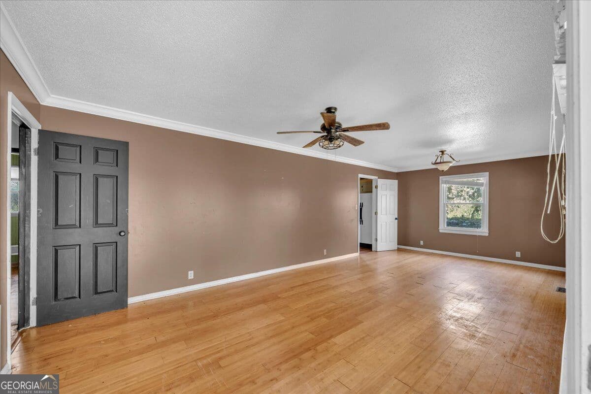3 bedroom, 2 bathroom, 1,817 sq ft single family residence for sale at 6555 GA Hwy 313, Warwick, GA 31796 — photo 5
