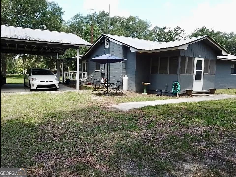 3 bedroom, 1 bathroom, 1,248 sq ft single family residence for sale at 379 Bob Thrift Road, St. George, GA 31562 — photo 2