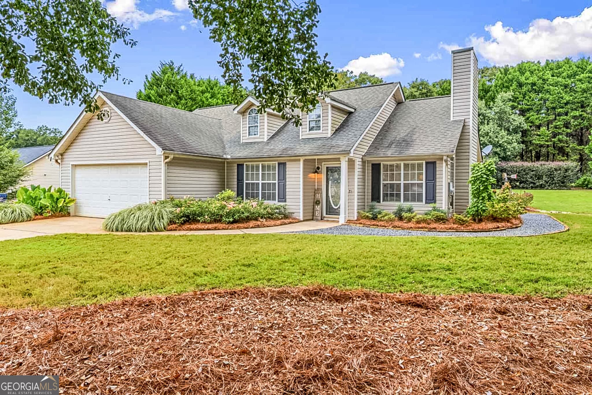3 bedroom, 2 bathroom, 1,347 sq ft single family residence for sale at 2042 Big Cypress Lane, Locust Grove, GA 30248 — photo 2