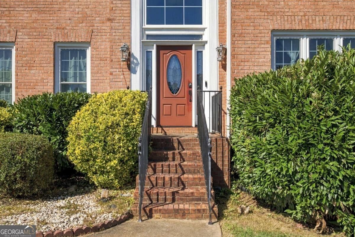 4 bedroom, 3.5 bathroom, 2,952 sq ft single family residence for sale at 5503 Mountain View Pass, Stone Mountain, GA 30087 — photo 2